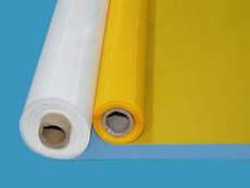 Two rolls of high quality polyester mesh in white and yellow with kraft paper cores.
